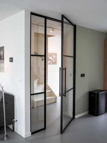 Black hinged door with slim frames